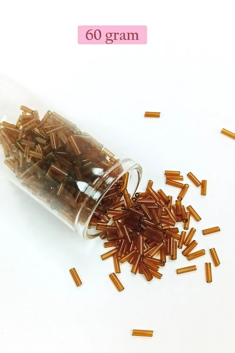 Uzun Boru Kesme Boncuk Çap 2mm Uzunluk 10 mm - 60 Gram - Şeffaf Kahverengi - BNC285